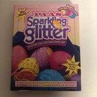 PAAS Egg Color Set box with glitter patch colors, blue/pink egg molds, and bold “Sparkling in the Paint!” text.