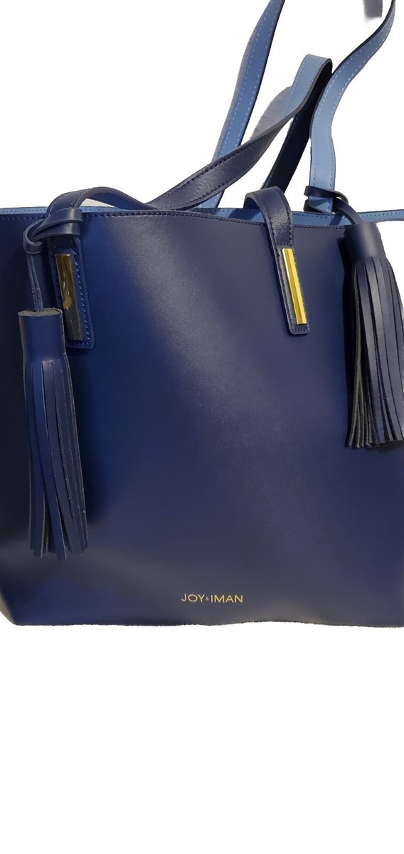 Joy IMAN Genuine Leather Blue Tassle Organizer Tote, material is