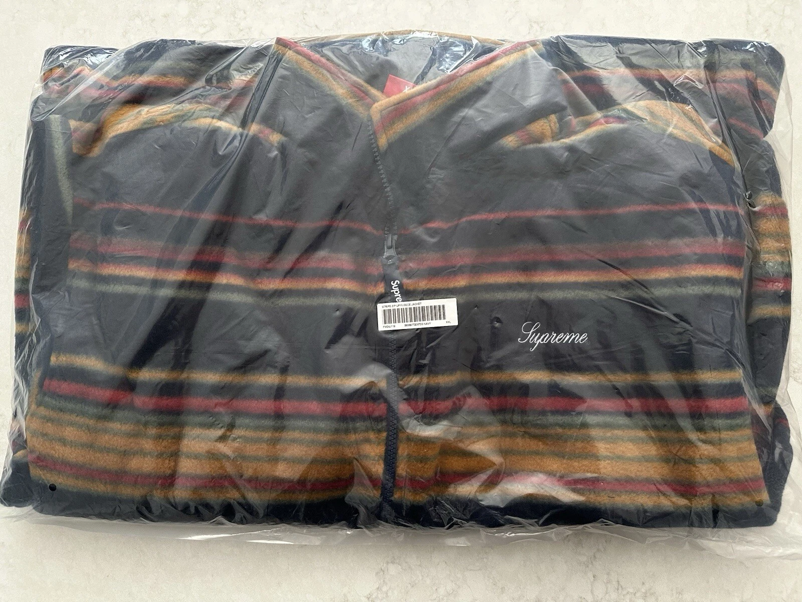 Veste polaire zippée rayée taille XXL Supreme FW24 bleu marine multicolore neuve EN MAIN