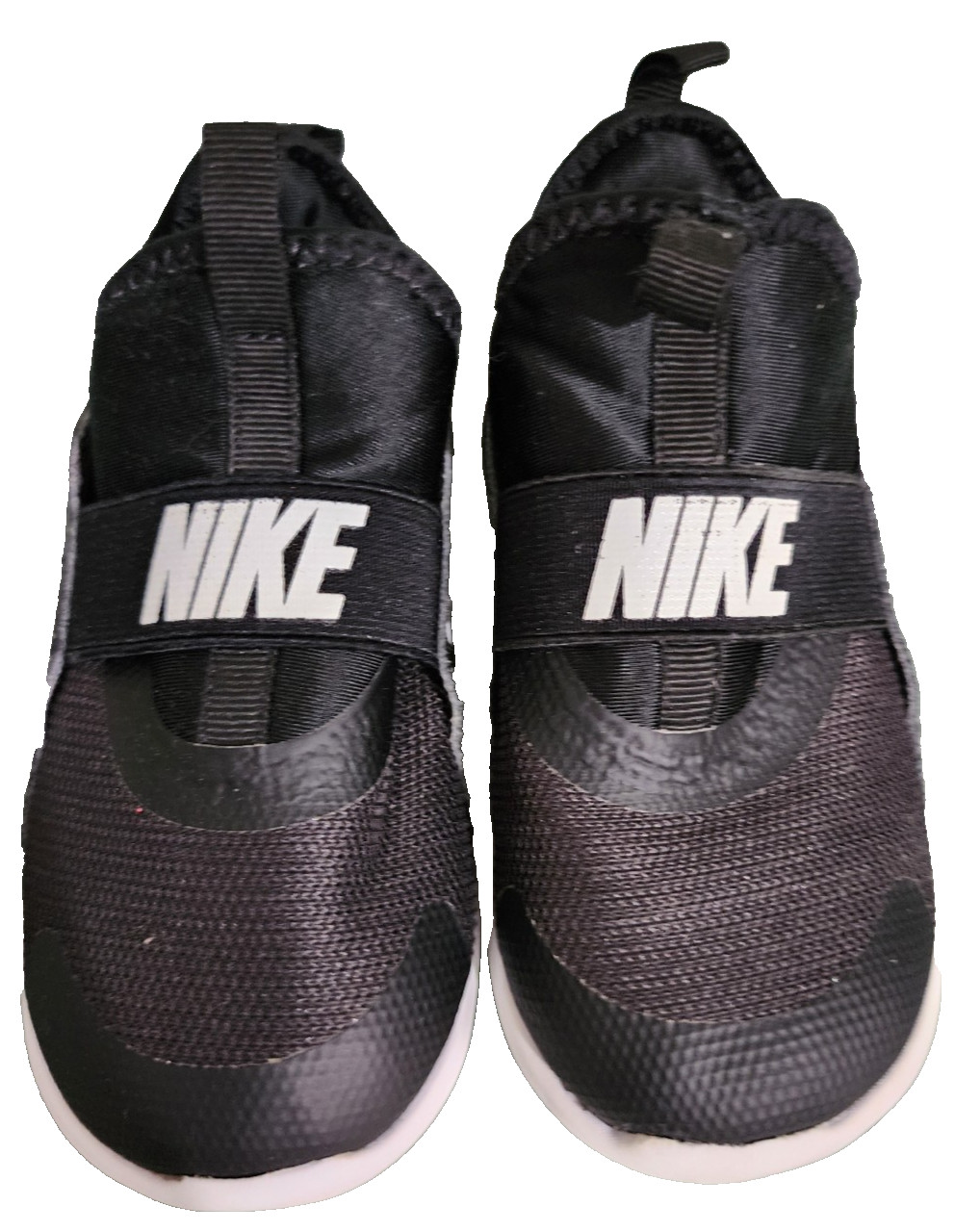 Nike Flex Runner slip on shoes size 10C (age 4-5)	Black & white