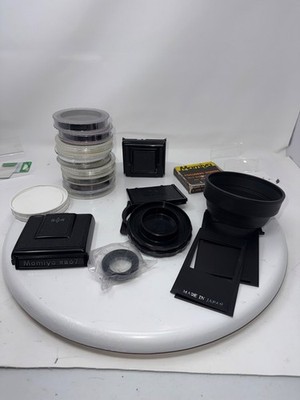 Mamiya RB67 filters and parts.