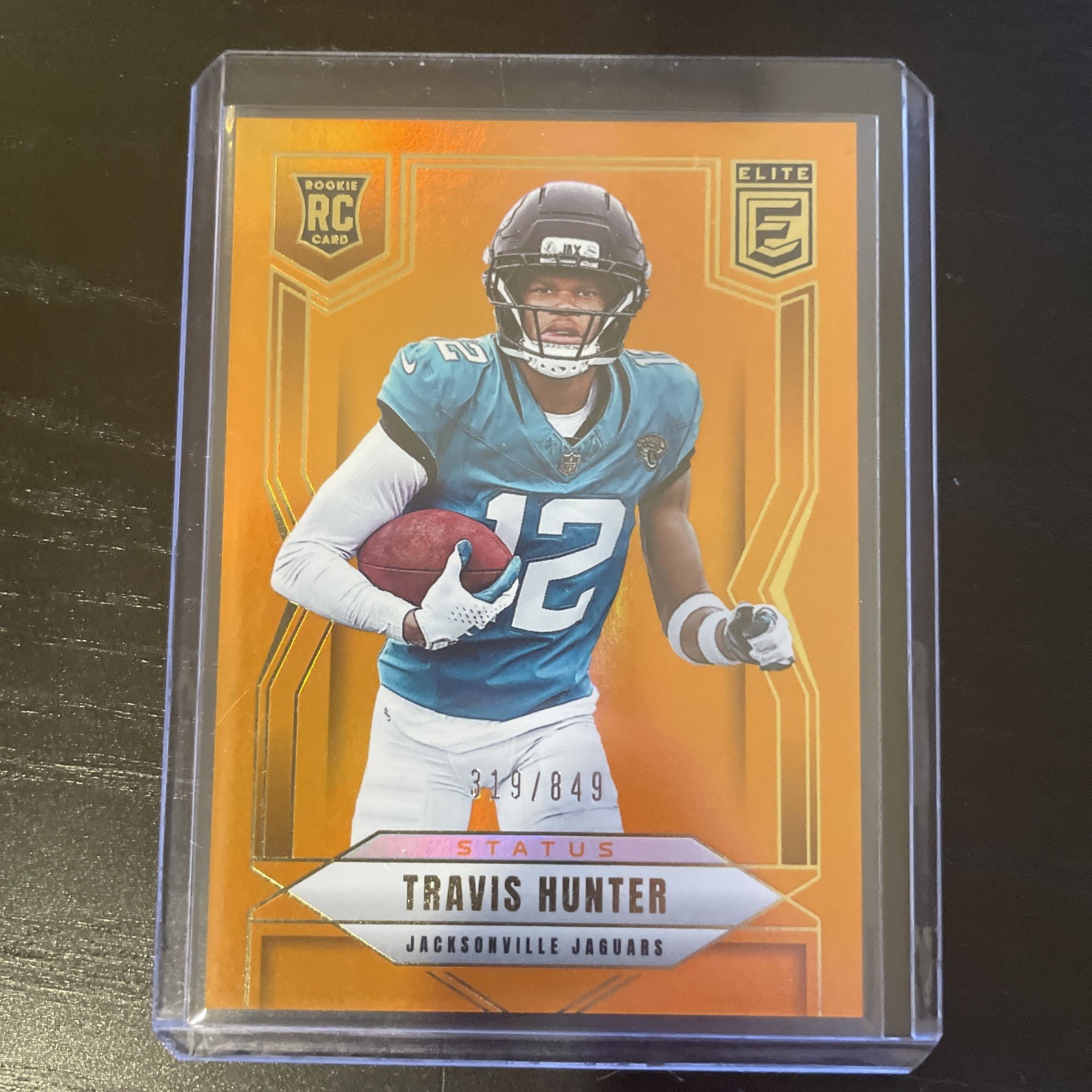 2025 Donruss Elite - Rookies Travis Hunter #114 Status Metallic Orange /849 (RC)