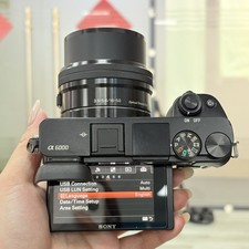 Black Sony Alpha A6000 Mirrorless Digital Camera w/16-50mm Lens with SD Card