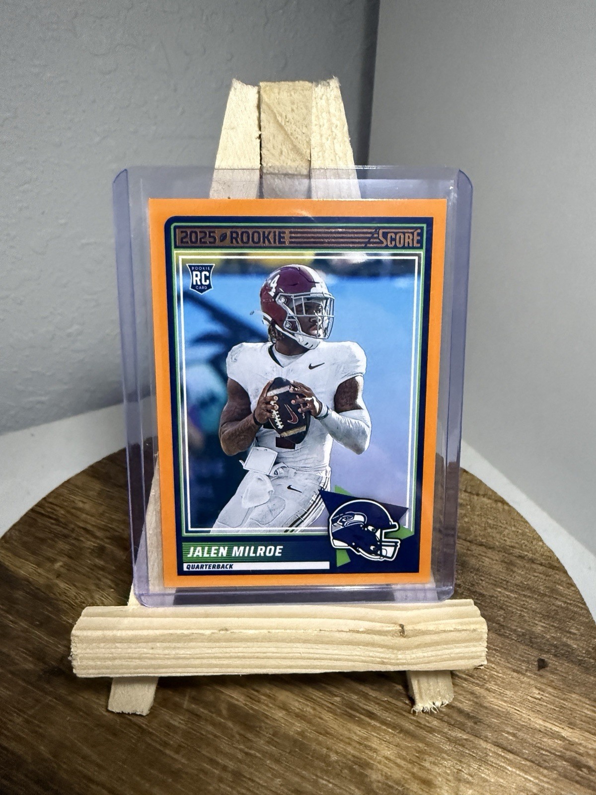 2025 Score Jalen Milroe #29 Rookie Orange Flood Border Parallel (RC) Seahawks