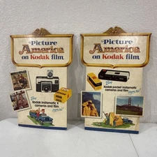 Vintage 1970’s Kodak Cameras Cardboard Sign Stand Up Store Display 11” Lot Of 2