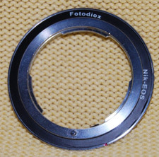 NIKON F lenses will fit CANON EOS camera using THIS A  FOTODIOX NIK-EOS adapter