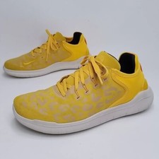 Nike Free RN Running Shoes Women's size 9 Yellow Suede Cheetah Print AQ0562-700