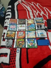 Nintendo DSi Blue Handheld Console  System  14 games Charger and case 2 gb card 