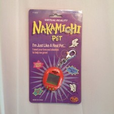 Vtg NOS Virtual Reality Nakamichi Pet Dino Electronic Interactive Keychain Toy