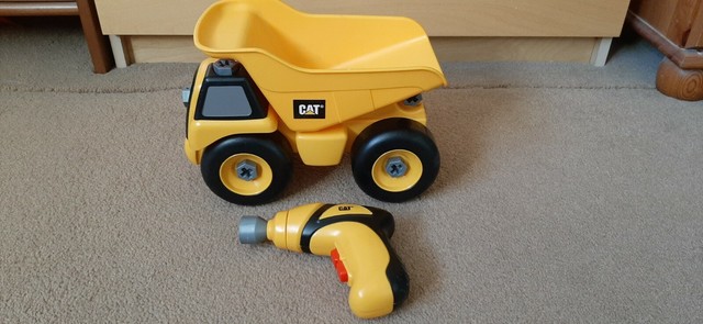 cat take apart dump truck