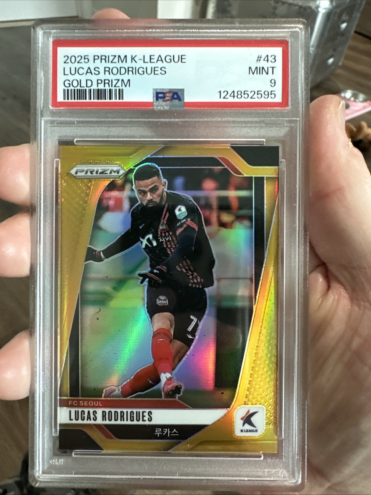 2025 Panini Prizm K-League Gold Prizm #43 Lucas Rodrigues /10 POP 1 PSA 9 view 2