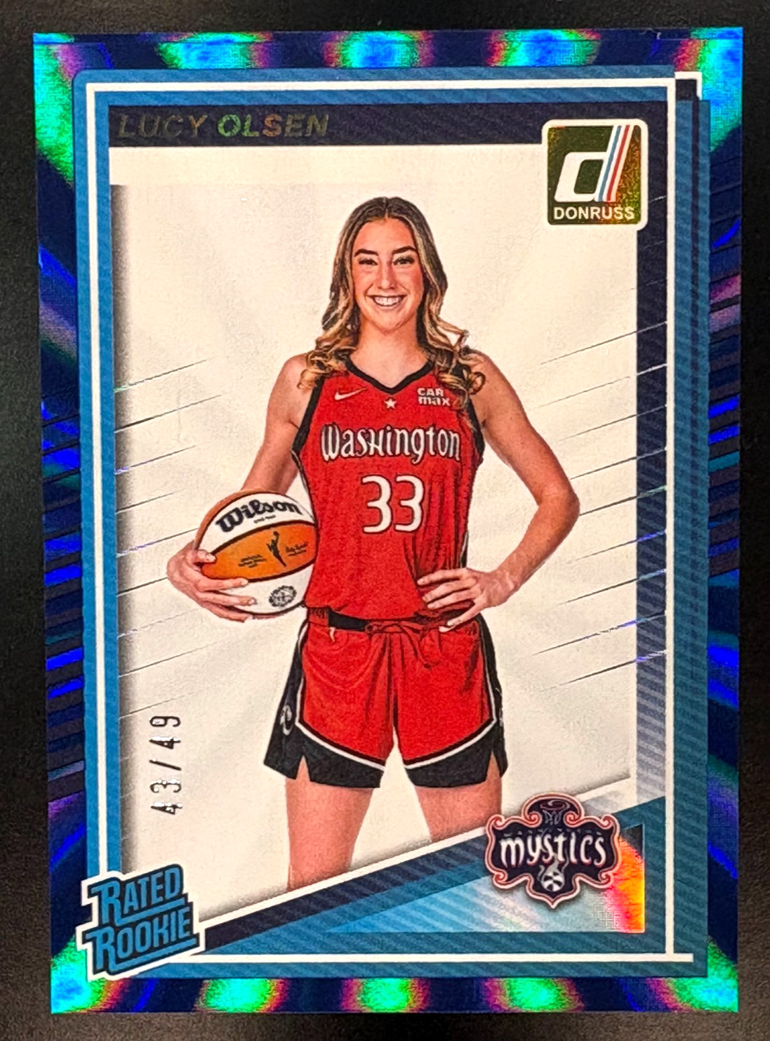 LUCY OLSEN Blue Laser RC /49 - 2025 Panini Donruss WNBA Rated Rookie Mystics