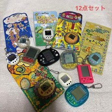 Angel's Tamagotchi digital pet set comes in multiple pieces 11e144