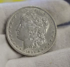1899 O US Morgan Silver Dollar $1 AU (Cleaned)