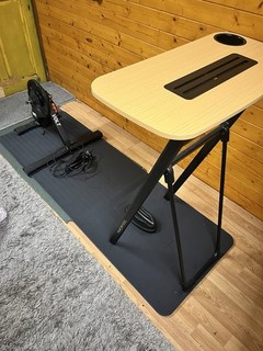 Jet Black Volt Smart Turbo Trainer with Van Rysel Table Riser Block And Mat