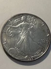 1990 Silver American Eagle One Dollar Ounce Silver  BU  N562