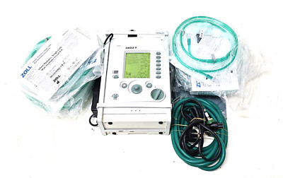 Zoll Impact Uni-Vent Eagle II Portable 731 800-EGL2-03 W/ Charger W/ Extra Parts