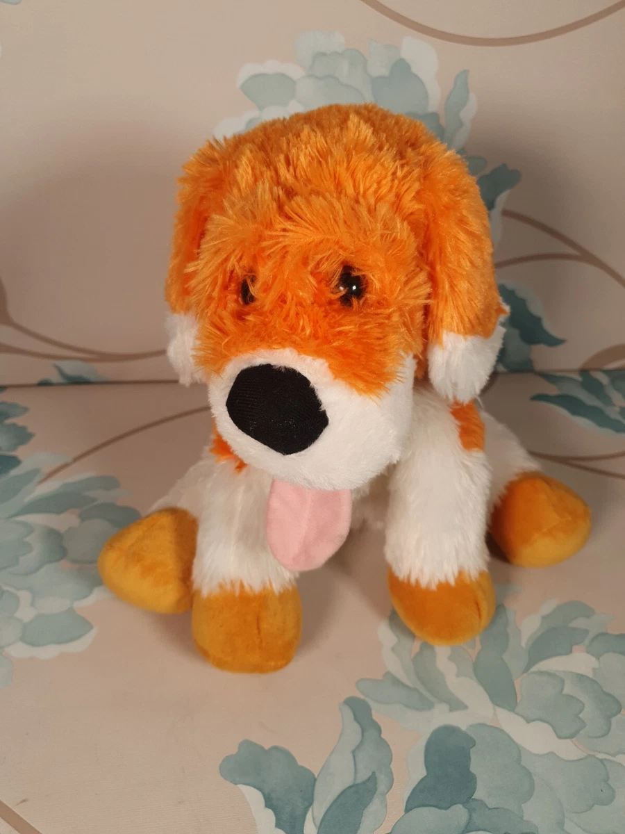 Orange top stuffed dog
