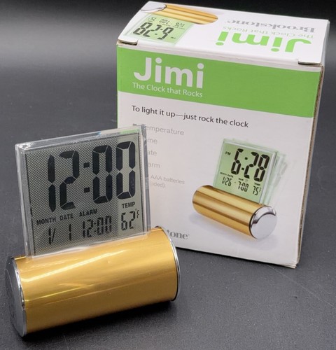Jimi The Clock That Rocks by Brookstone Temperature Time Date Alarm Lights Gold