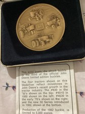 1982 John Deere Belt Buckle, Round Brass buckle Featuring 4 JD Tractors