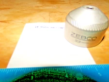 33 MICRO SPIN REEL CAP IN GREAT SHAPE