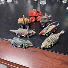Lot of 7 Dinosaur Cars Trucks Some Pull Back T Rex Stegosaurus Dino Dinos
