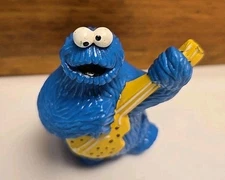 Cookie Monster Playing Guitar Toy Figure Sesame Street Muppets Inc PVC 1982 VTG
