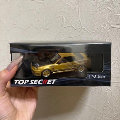 TOP SECRET ゴールドミニカー 1:43 スケール s-l400.jpg