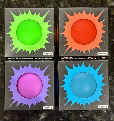 NeeDoh Glow in the Dark Sensory Ball Lot Of 4.  Blue, Green, Purple, Orange