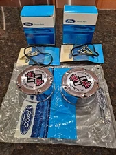 F1TZ-1K104-A    Ford front 4x4 Automatic locking hub caps with seals and screws.