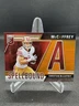 2024 Donruss Elite Christian McCaffrey Orange Spellbound /99 Letter A #15 49ers