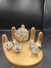 Vintage Clear AB Faceted Glass Cluster Brooch And Two Pairs Of Clip On Earrings