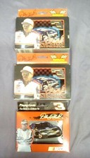 LOT OF DALE EARNHARDT COLLECTOR TIN & STANDARD PLAYING CARDS