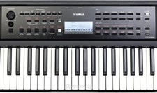 Yamaha PSR-E383 61-key Mid-range Portable Keyboard with PA130 Power Adapter