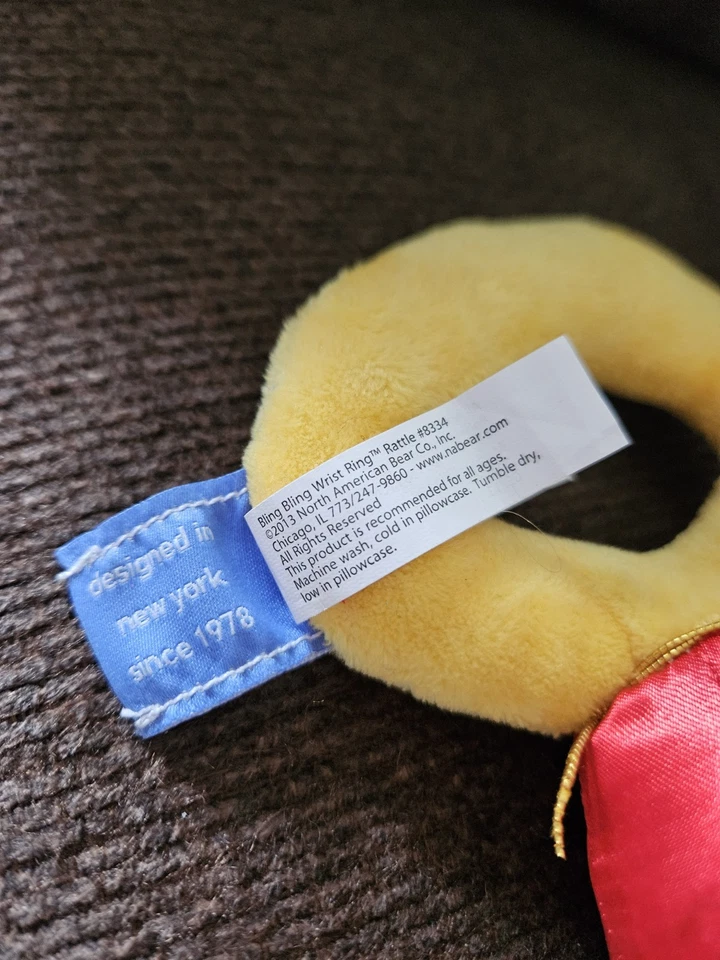 Anillo de muñeca North American Bear Company rubí brillante suave felpa sonajero juguete para bebé Foto 3 de 3