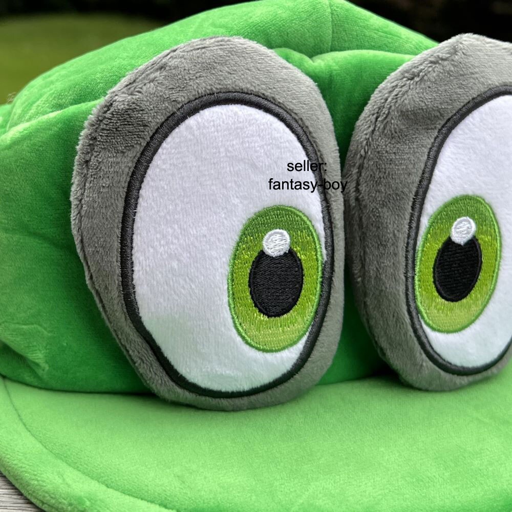 Laruokivi Odyssey Cappy Hat 3D Con Ojos Abultados Y Personajes Peludos Interpretando El Regalo Del Sombrero Verde Luigi