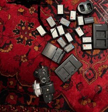 Sony a7s ii camera body  Sony E 2.8/16 Lens  batteries  chargers