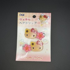 Vintage Sanrio tanned Hello Kitty with Hibiscus hair clips one pair HC21