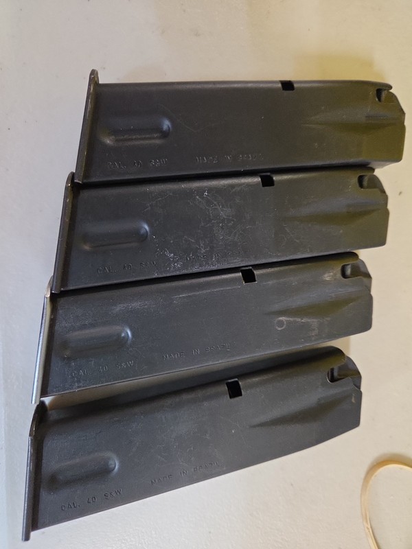 LOT OF 4 TAURUS PT 100 10-ROUND MAGAZINES 40S&W LEO FACTORY OEM 