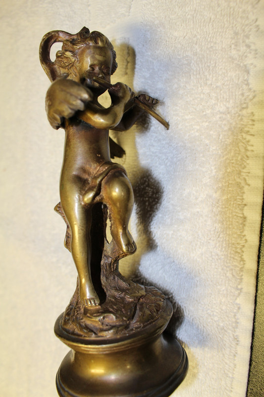 Vintage Brass 7.5" Flute Player with Swan on his back & head of swan on his head