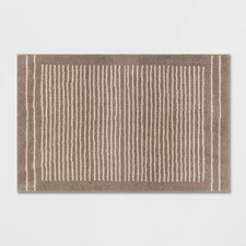 2'6"x4' Washable Knitted Stripe Accent Rug Tan - Threshold