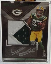 2022 Panini Black - Rookie Patch Autographs Romeo Doubs #240 Emerald /25 (AU,...