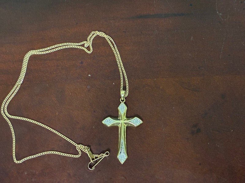 Diamond Crucifix Pendant:  Four (4) Genuine Diamonds. Made in 14K Yellow Gold