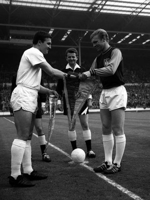 West Ham United captain Bobby Moore exchanges pennants R Brunnenm 1965 Photo