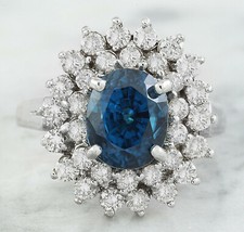 Amazing Flower Cluster Vivid Blue Oval Cut Lab Created Sapphire Prong Style Ring