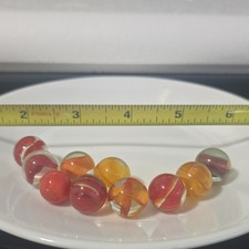 Lot of 8 Machine-Made Glass Toy Marbles Clear Swirl Mixed Styles Red Orange