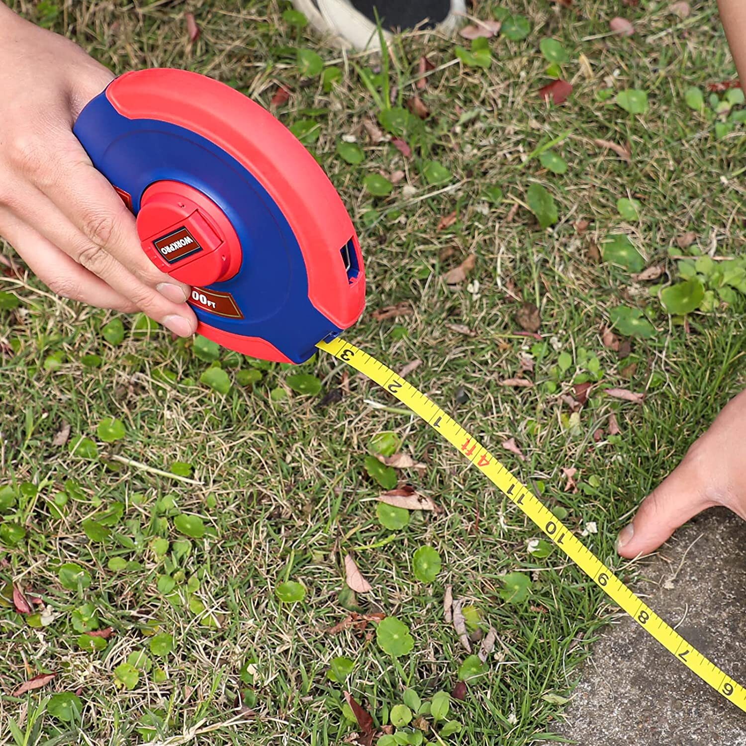 workpro-100-ft-tape-measure-closed-reel-steel-with-foldable-handle