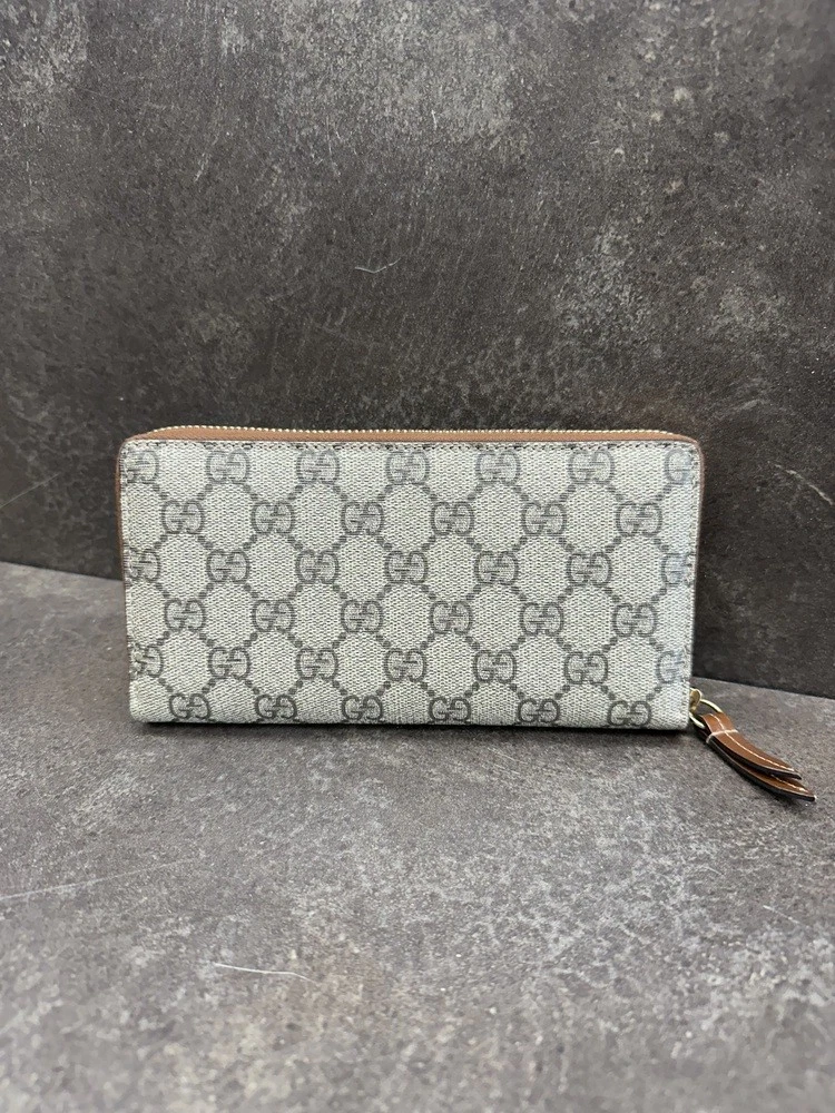 Portefeuille Gucci GG Supreme 410102 en toile zippé autour