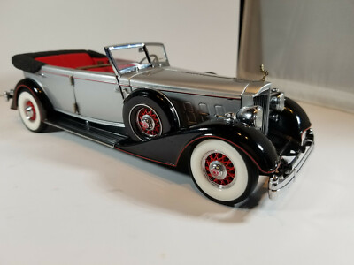 1934 Packard Twelve Convertible Victoria by Dietrich - a photo on