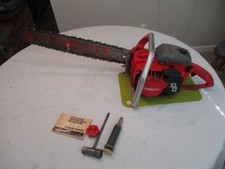 Motosega vintage 1976 rossa Homelite XL12 con barra 20" funziona bene